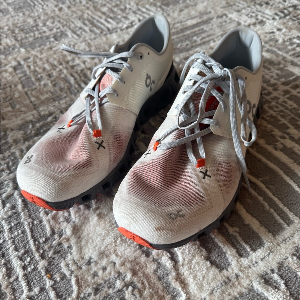 On Running White and Pink Sneakers